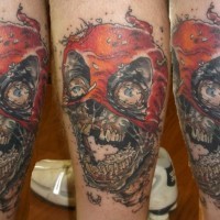 Stunning 3D like colorful very detailed leg tattoo on evil zombie skull