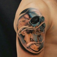 Stunning 3D natural looking very detailed mystic skull tattoo on shoulder