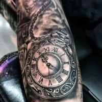 Stunning black and white gorgeous antic clock tattoo on arm