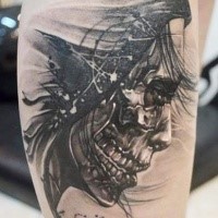 Stunning black and white horror style arm tattoo of mystical monster portrait