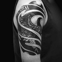 Stunning black and white original shaped tattoo on shoulder combined with flying night bird