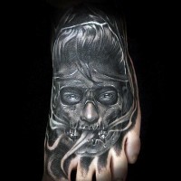 Stunning black and white smoking monster tattoo on foot