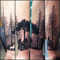 Stunning blackwork style forearm tattoo of forest with deer