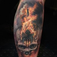 Stunning colored arm tattoo of burning church with human skull