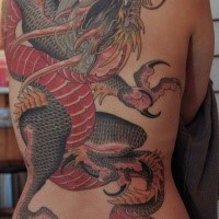 Stunning colored whole back tattoo of Asian fantasy dragon