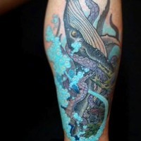 Stunning designed big colored wale with octopus tattoo on leg