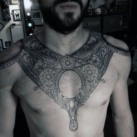 Stunning detailed black and white armor like tattoo on chest and shoulders