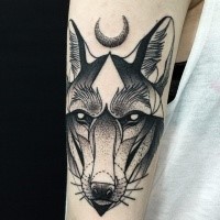Stunning dotwork style painted by Michele Zingales upper arm tattoo of wolf head with moon