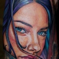 Stunning looking realism style colorful arm tattoo of beautiful woman portrait