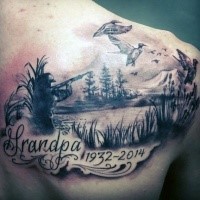 Stunning memorial themed black and gray style shoulder tattoo of hunter with lettering