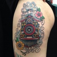 Stunning old school train tattoo on upper arm with lettering
