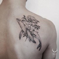 Stunning outline style painted bu Zihwa tattoo of whale and flower on scapular
