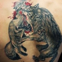 Stunning realism style colored back tattoo of wolf with bloody fox