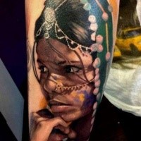 Stunning realism style colored Indian woman portrait tattoo on forearm