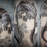 Stunning tribal style painted alligator tattoo on shoulder