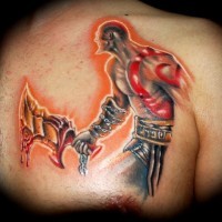 Stunning very cool colored video game barbarian tattoo on chest with big bloody sword