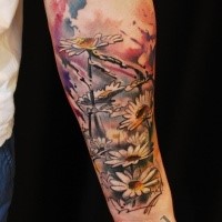 Stunning very detailed forearm tattoo of wildflowers