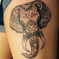 Stylized black ink elephant head tattoo