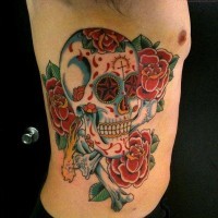Sugar skull with roses tattoo on ribs