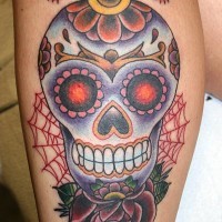 Sugar skull with rose web and diamonds tattoo