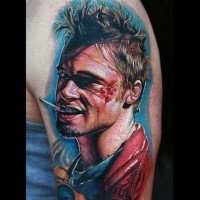 Superior colored Brad Pitt movie hero portrait tattoo on shoulder