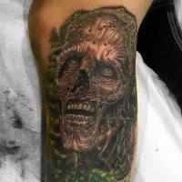 Superior detailed colored big monster face tattoo on leg