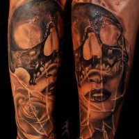 Superior horror style forearm tattoo of human skull with woman face
