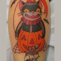 Superstitious black cat in Halloween pumpkin costume and number 13 colored leg tattoo