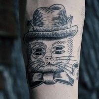 Surrealism like black ink dot style forearm tattoo of cat with hat and smoking pipe
