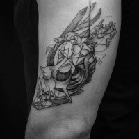 Surrealism style black ink arm tattoo of strange looking ornament