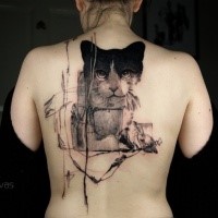 Surrealism style black ink back tattoo of cat face with ornaments
