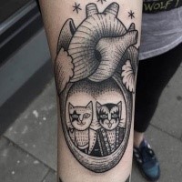 Surrealism style black ink forearm tattoo of human hear with cat couple