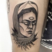 Surrealism style black ink thigh tattoo of demonic woman face with vine