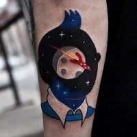 Surrealism style colored arm tattoo of human silhouette stylized with space ship and planet