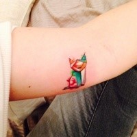 Surrealism style colored arm tattoo of cat shaped figure