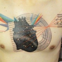 Surrealism style colored chest tattoo of human heart with various ornaments and lettering