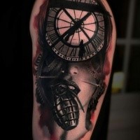 Surrealism style colored shoulder tattoo of woman face stylized with clock and grenade