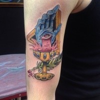 Surrealism style colored shoulder tattoo of creepy hand with feather and symbol