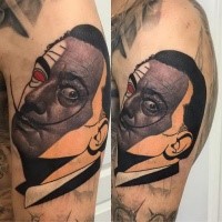 Surrealism style colored shoulder tattoo of of funny man portrait