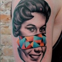 Surrealism style colored shoulder tattoo of woman with geometrical figures