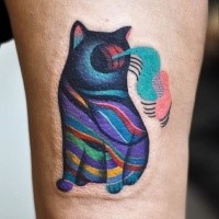 Surrealism style colored thigh tattoo of cat