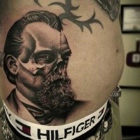 Surrealism style detailed belly tattoo of man face stylized with skull