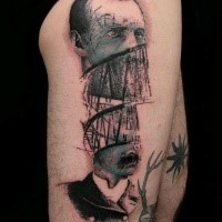 Surrealism style detailed thigh tattoo of divided mans portrait