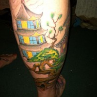 Sweet looking colored leg tattoo of antic Asian house and beautiful tree