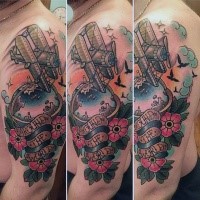 Sweet looking colored shoulder tattoo of flying plane flowers and lettering