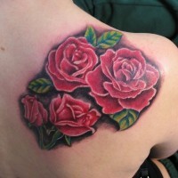 Sweet usual colored big flowers tattoo on shoulder