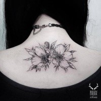 Symmetrical deisgned by Zihwa upper back tattoo of wildflowers