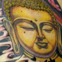 Golden peaceful buddha tattoo