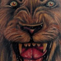 Realistic growling lion coloured tattoo