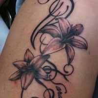 Tracery with flowers tattoo